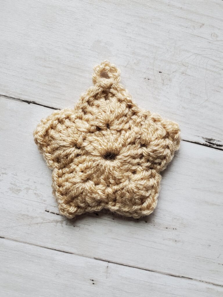 Crochet Christmas Tree star ornament in aran