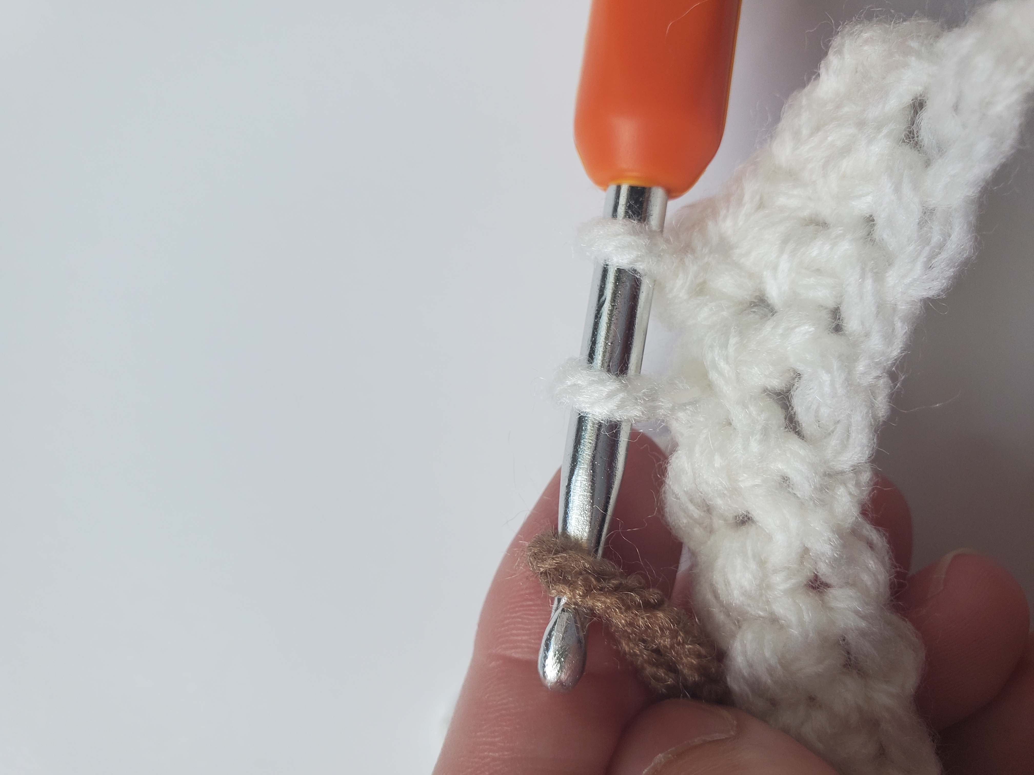 Step 3 of color change technique crochet