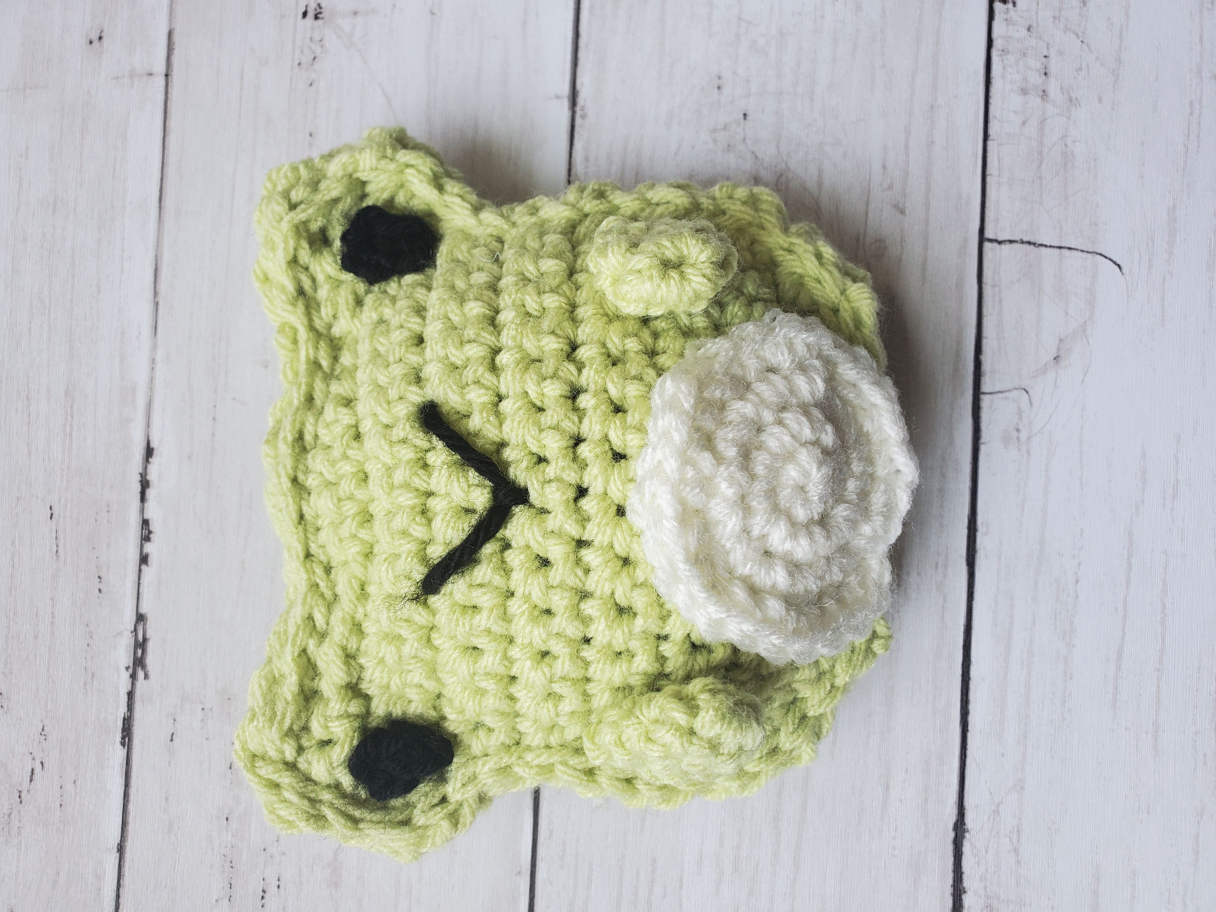Finished crochet frog with arms