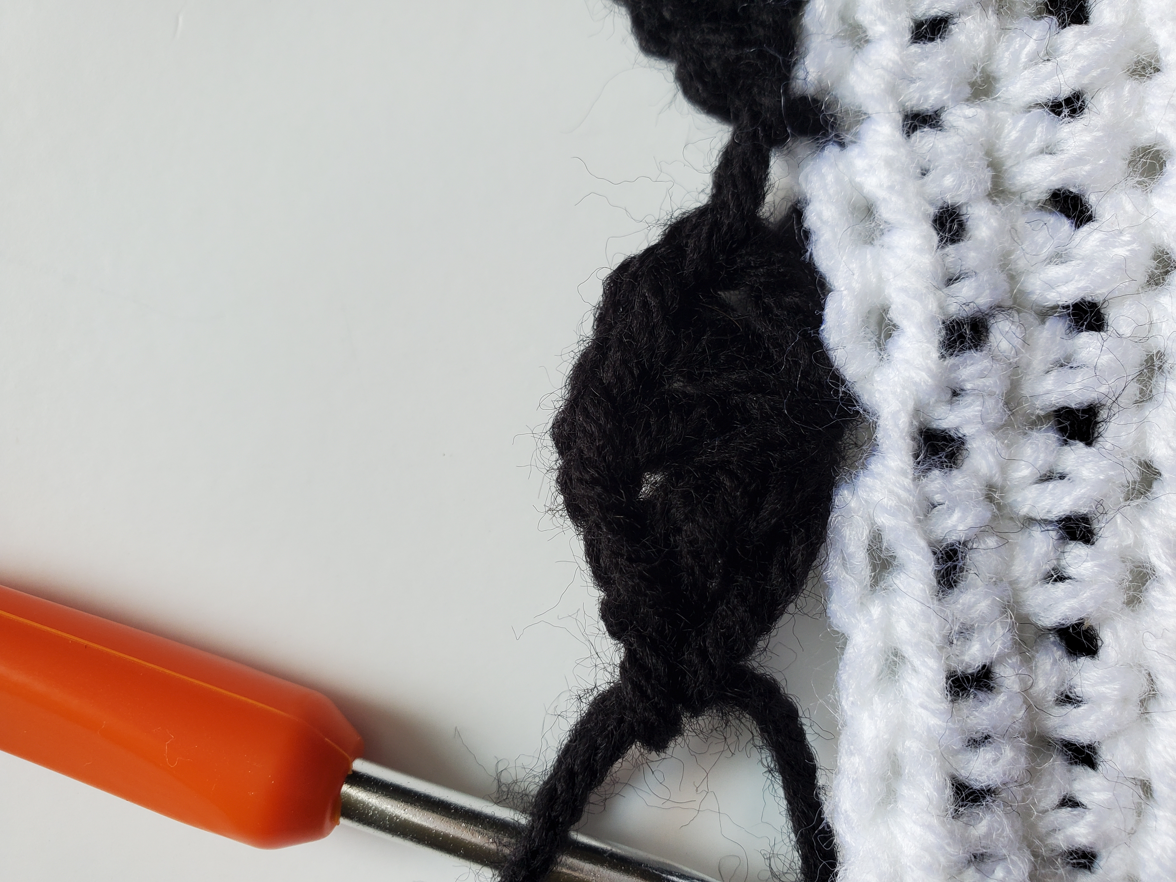 Close up of shell stitch