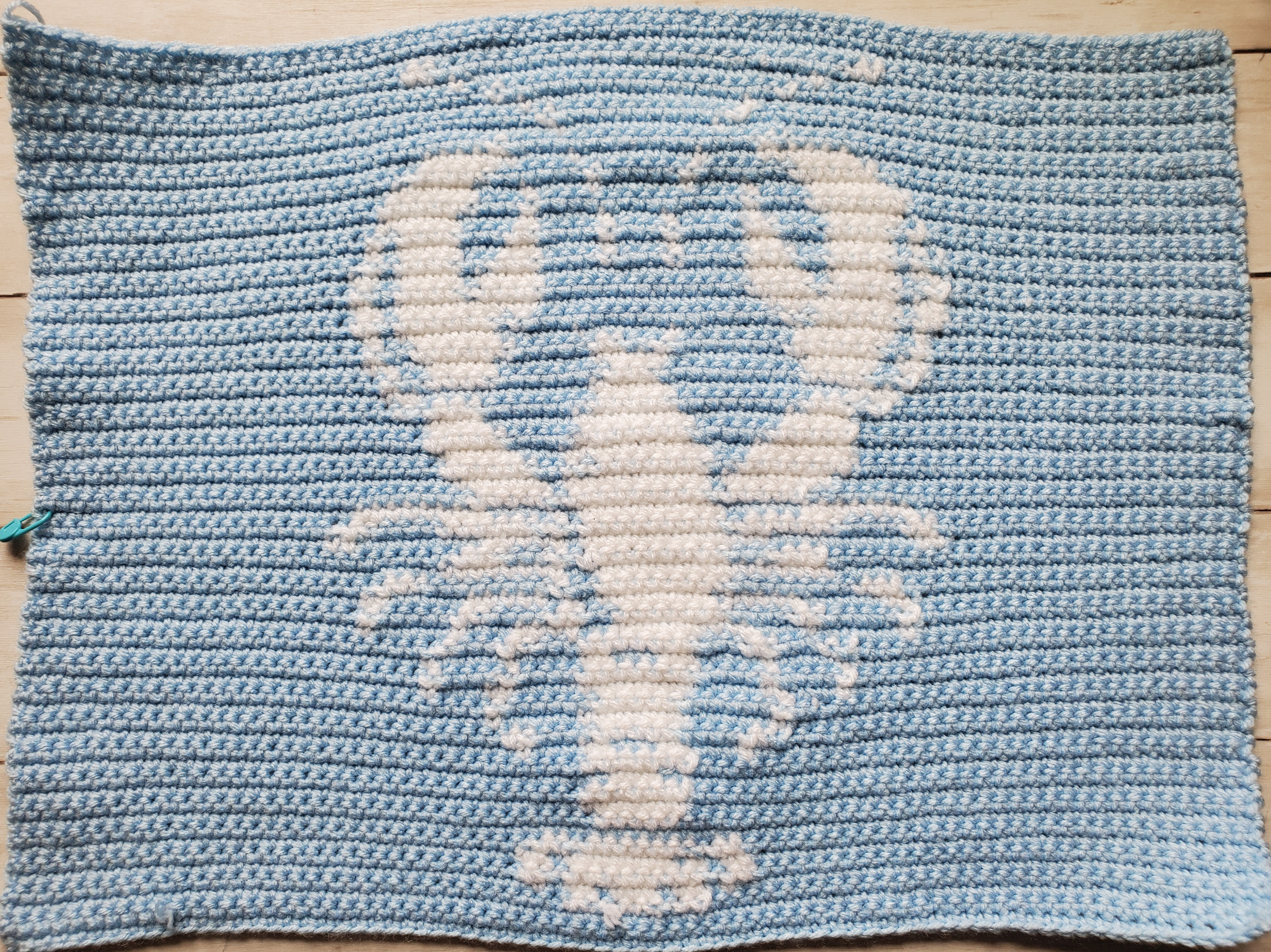 Finished front panel of crochet lobster pillow
