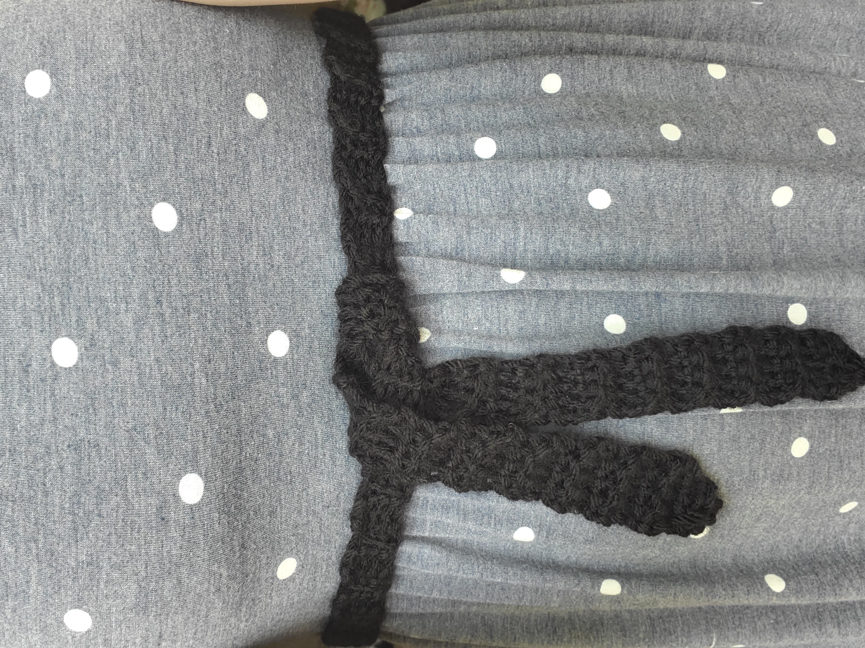 Simple and cute crochet belt with polka dot dress