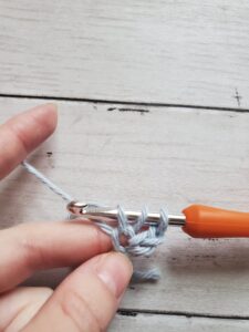 Pull Yarn Through First Loop for Double Crochet